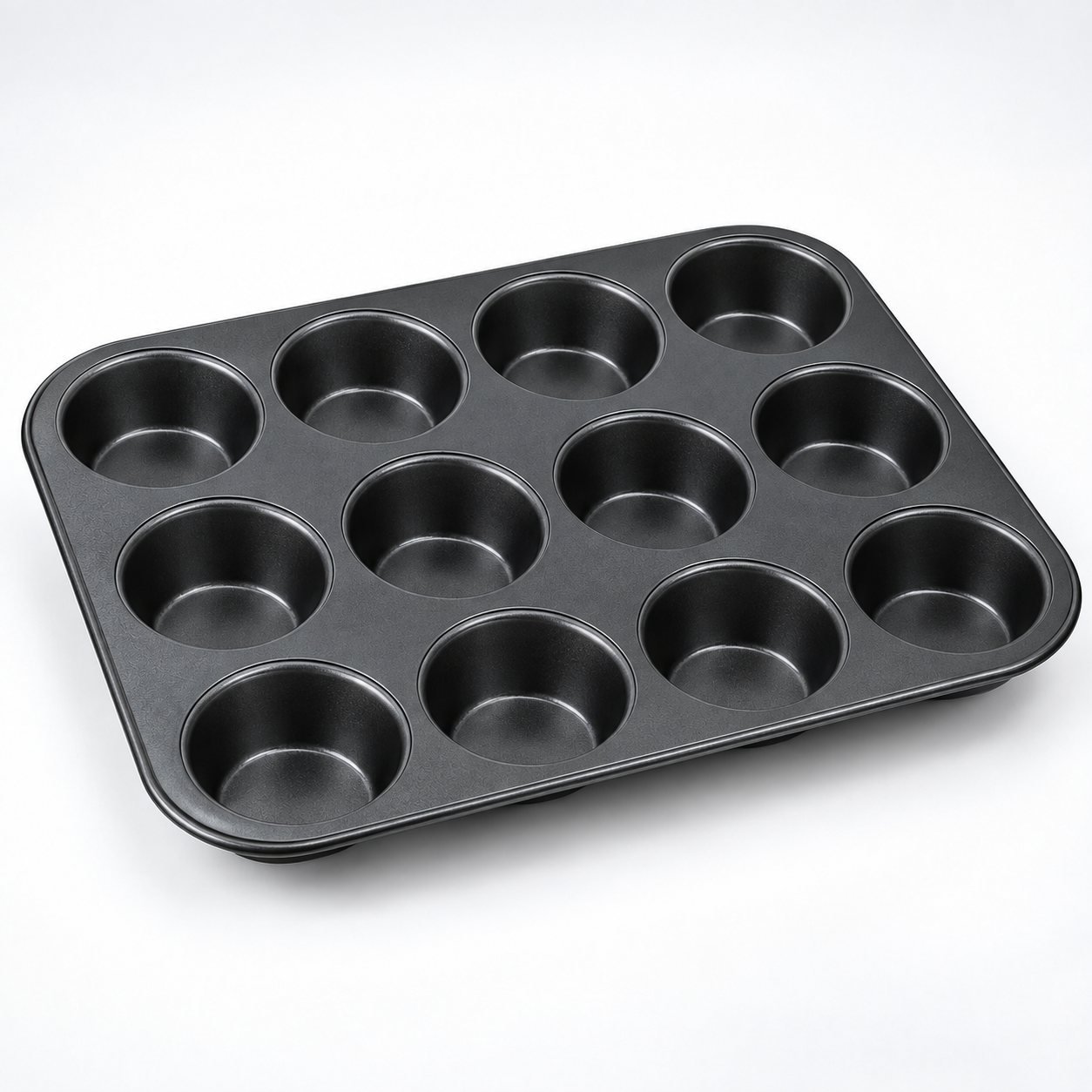 Muffin Tray, Twelve Cup, Non Stick, shown from a low three quarter angle