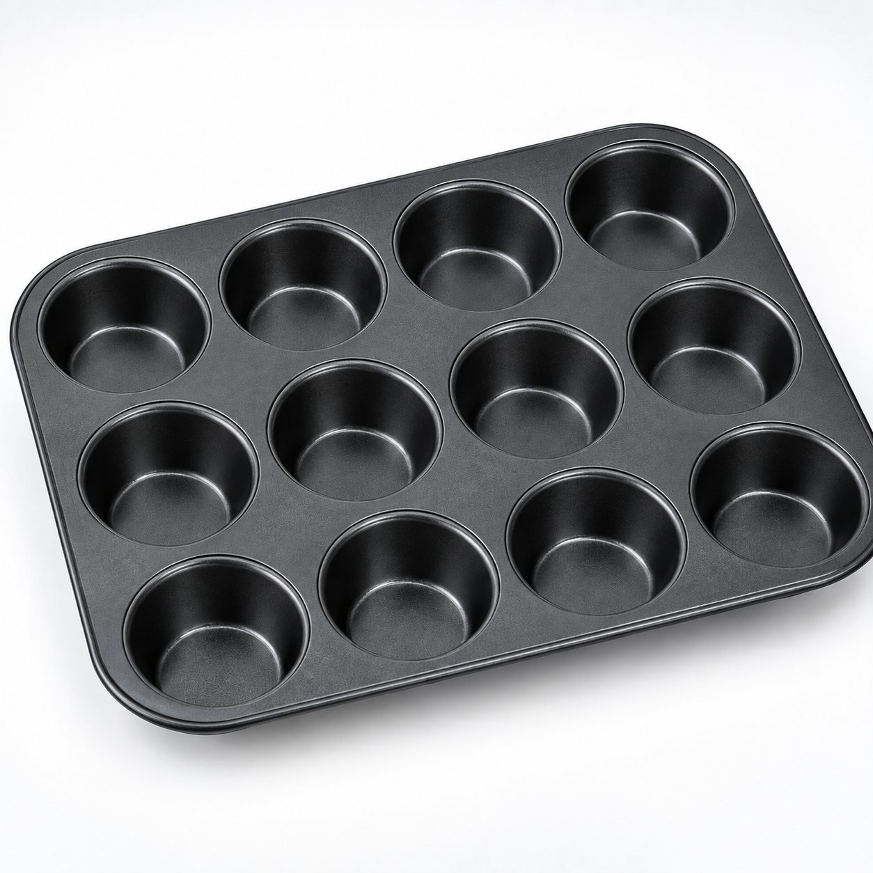 Muffin Tray, Twelve Cup, Non Stick, close up detail of the surface and finish