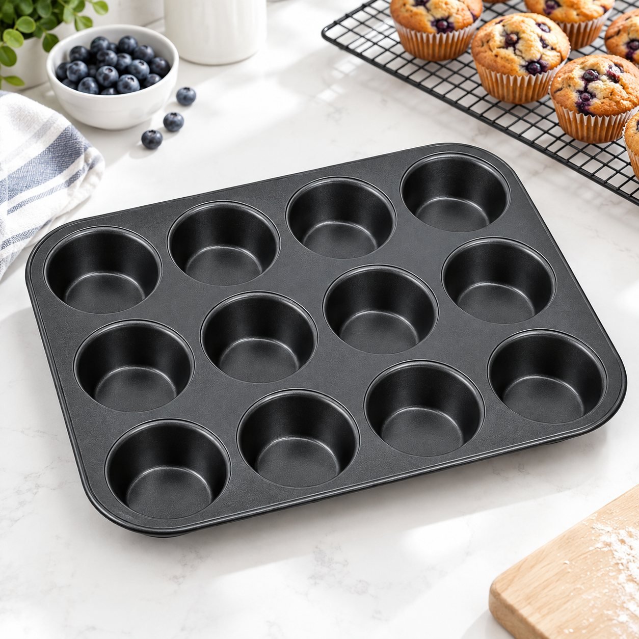 Muffin Tray, Twelve Cup, Non Stick, shown in use on a bar counter