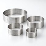 Perforated Tart Ring Set, 8, 10 and 20 cm, shown on a plain studio background
