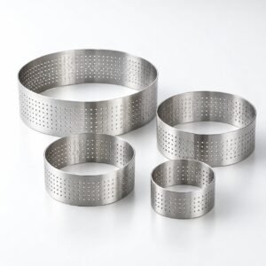 Perforated Tart Ring Set, 8, 10 and 20 cm, shown on a plain studio background