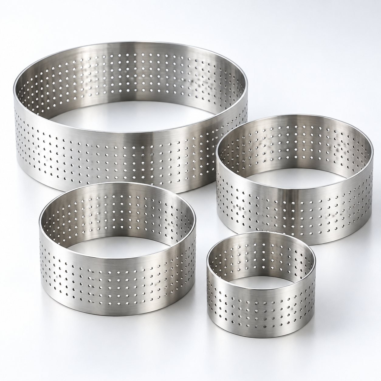 Perforated Tart Ring Set, 8, 10 and 20 cm, close up detail of the surface and finish