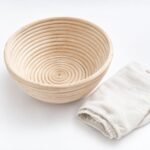 Round Banneton Proofing Basket, 22 cm, with Liner, shown on a plain studio background